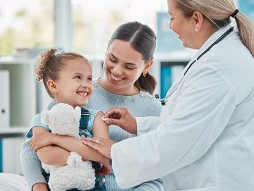 A child, parent and medical professional