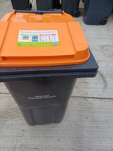 Orange lidded bin