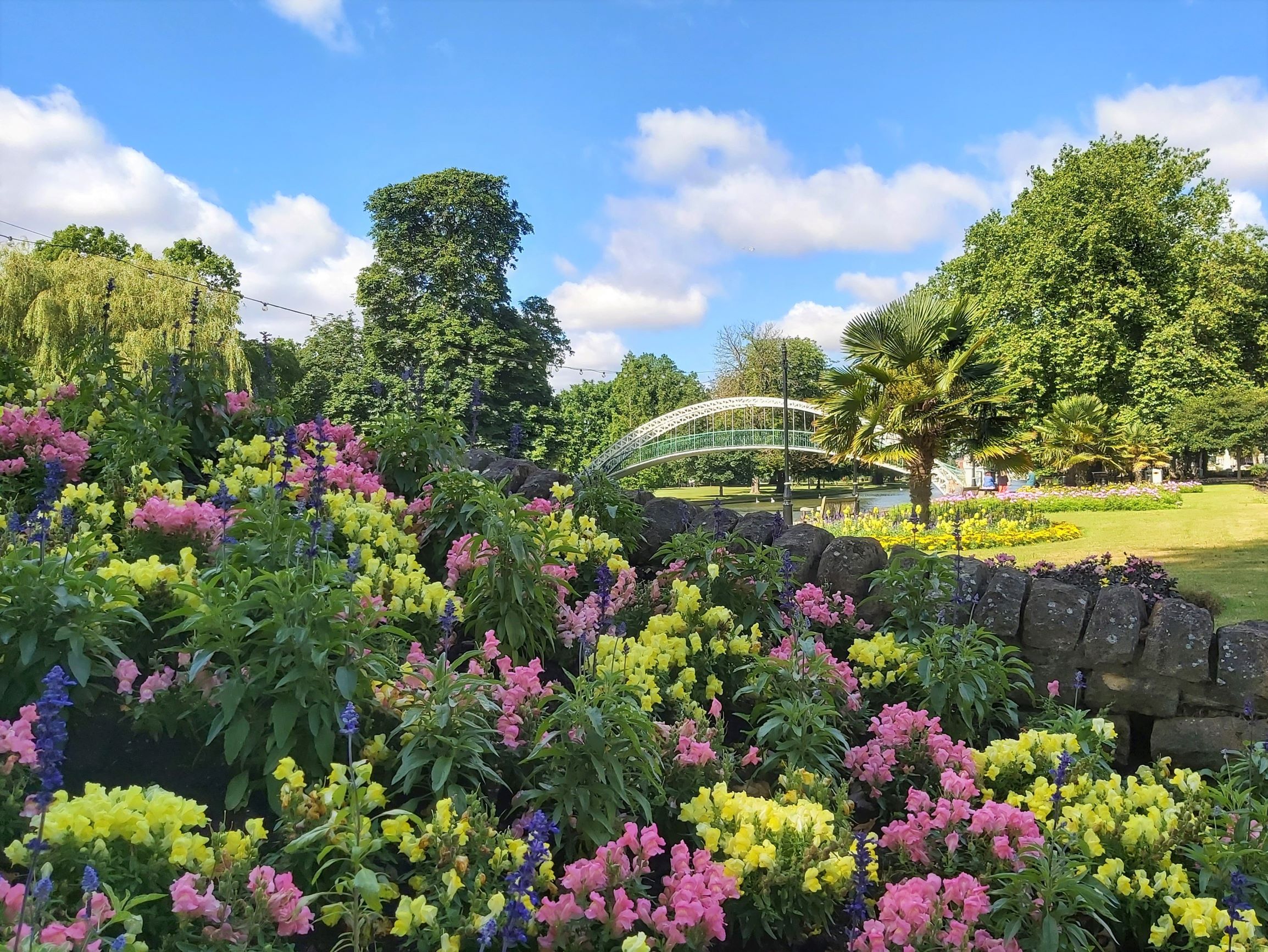 Bedford Embankment with bridge and flowers