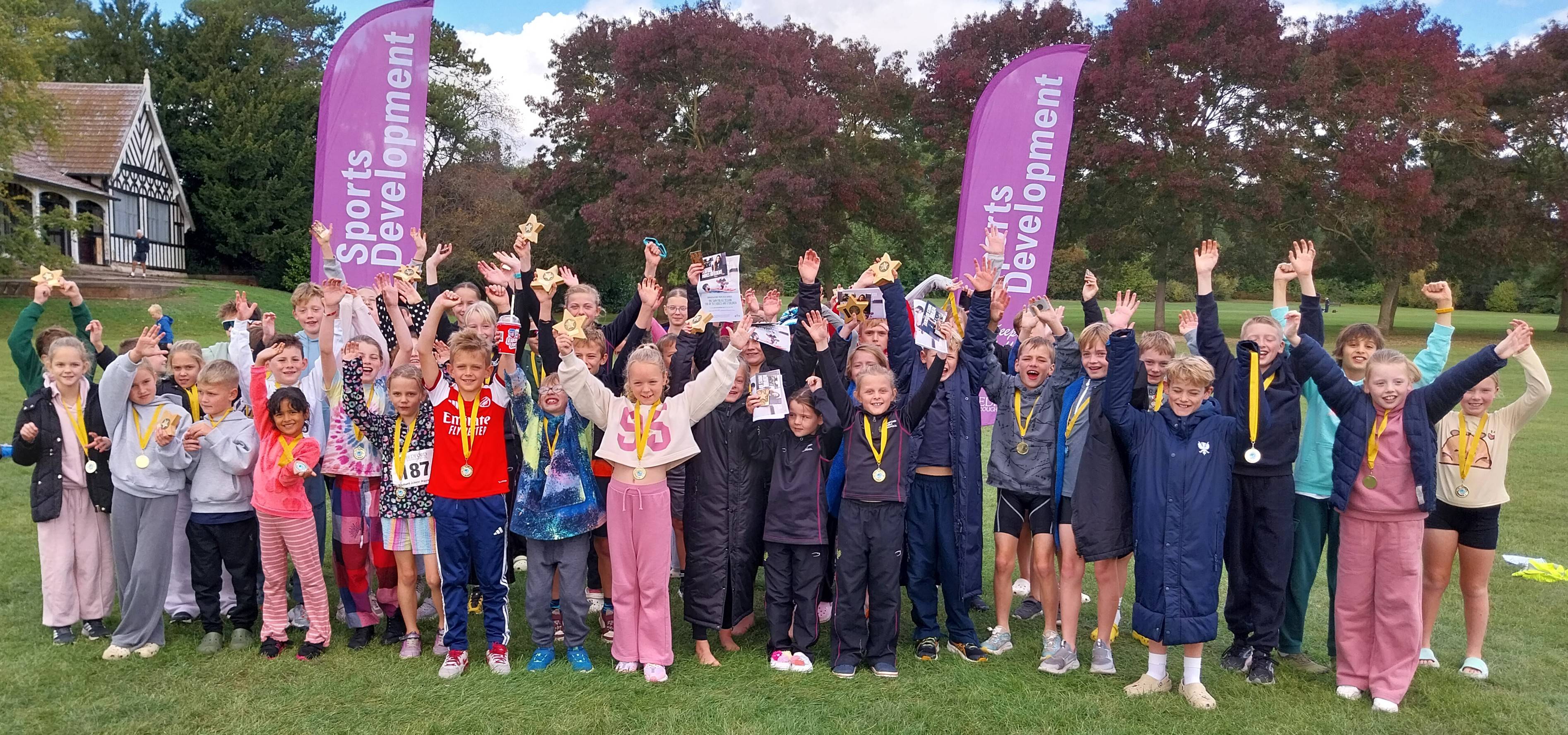 Participants of Junior Aquathlon with their medals
