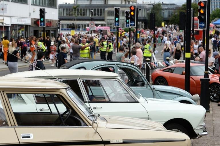 Line of classic cars on high street
