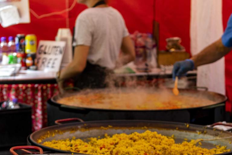 Large pans of cooked rice 