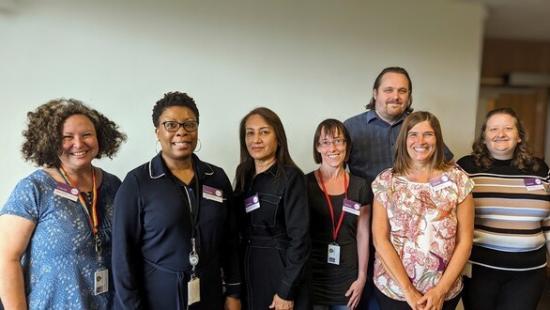 A picture of a group of staff who act as wellbeing champions to help their colleagues with wellbeing issues.