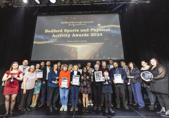 Group photos of the winners of the 2024 Bedford Sports and Physical Activity Awards with their awards