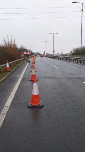 Paula Radcliffe Way with traffic cones along the inside lane
