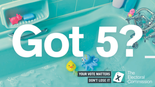 The text Got 5? is over a bath with children's toys floating on water