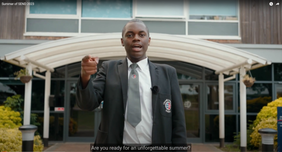 Young man in school uniform asking "Are you ready for an unforgettable summer?"