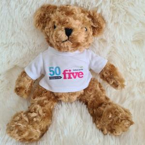Teddy bear with t-shirt that reads "50 things to do before you're five"
