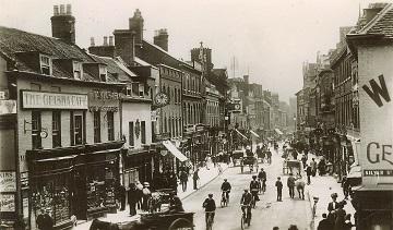 Old sepia-tinged picture of Bedford High Street
