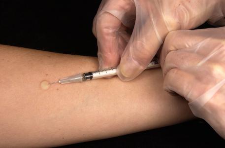 Child receiving an injection