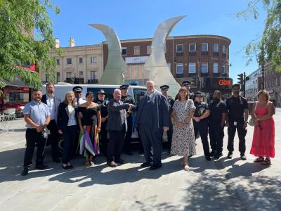 Mayor Tom Wootton and PCC John Tizzard with other councillors, and both police and council staff, at the launch of #TogetherForBedfordshire