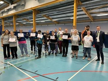 Participants of the Beyond Limits sessions standing in a leisure centre