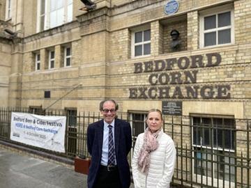 Cllr Robert Rigby and Michelle Corp from Age UK in front of the Corn Exchange