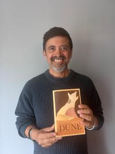 Councillor Paul Edmonds with a copy of Dune