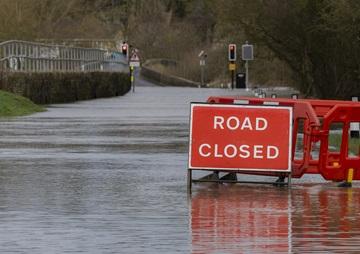 Harrold - Carlton  road closed sign on flooded road
