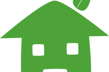 Image of a green house with a leaf shaped chimney