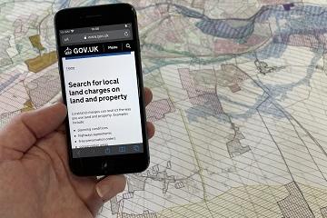Mobile phone showing an online search for local land charges