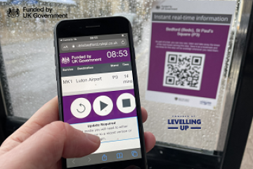 A mobile phone scanning a QR code