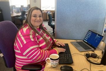 Kirsten Webber sat at her desk