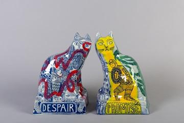 Two ceramic cats