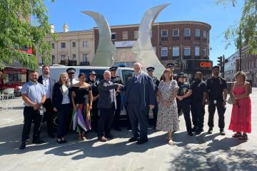 Mayor Tom Wootton and PCC John Tizzard with other councillors, and both police and council staff, at the launch of #TogetherForBedfordshire