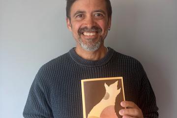 Councillor Paul Edmonds with a copy of Dune