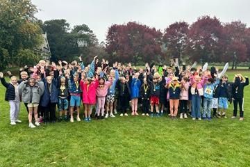 Bedford Aquathlon Winners Oct 25 - children cheering in the park