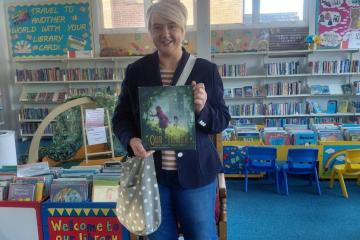 Councillor Caroline White with a copy of Our Tower