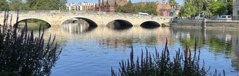 Bedford Town Bridge in summer with river in foreground 